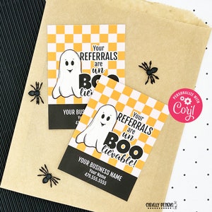 May include: Two Halloween-themed business cards with a ghost and a checkered background. The text on the cards reads "Your Referrals are Un-Boo-lievable!" and includes a business name and phone number.