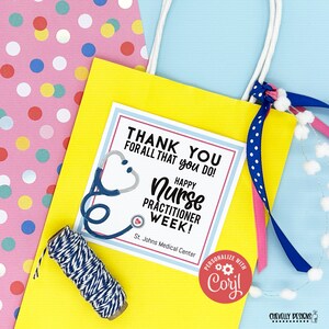 May include: A yellow gift bag with a blue and white polka dot ribbon and a white card that says "Thank You for all that you do! Happy Nurse Practitioner Week! St. Johns Medical Center". The card has a blue stethoscope with a red heart on it.