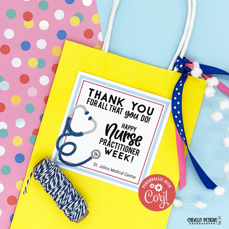 May include: A yellow gift bag with a blue and white polka dot ribbon and a white card that says "Thank You for all that you do! Happy Nurse Practitioner Week! St. Johns Medical Center". The card has a blue stethoscope with a red heart on it.