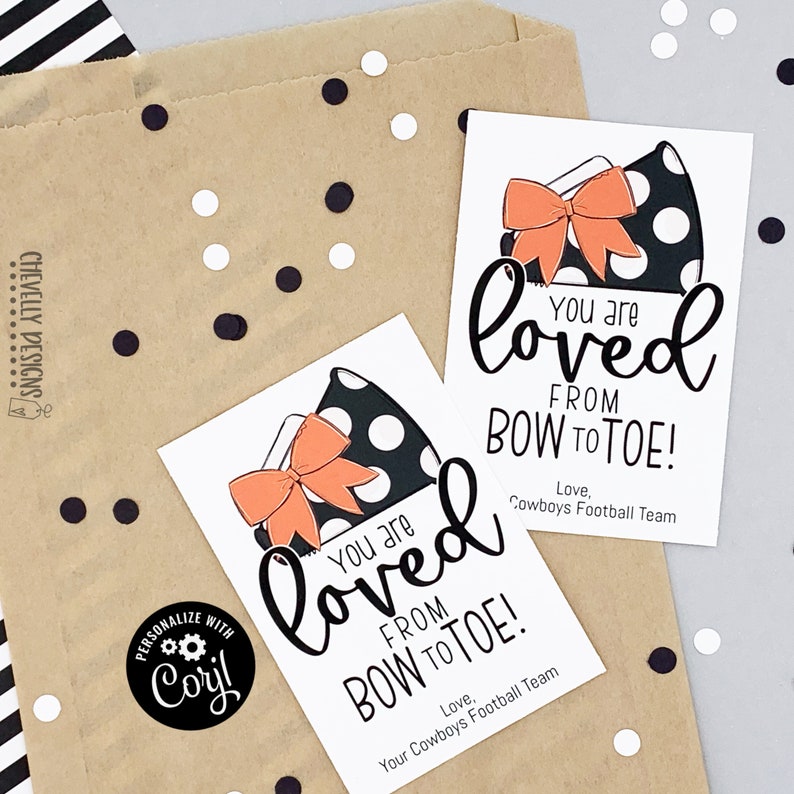 May include: Two printable gift tags featuring a black and white polka dot bow and the text "You are loved from bow to toe!" One tag has the text "Love, Cowboys Football Team" and the other tag has the text "Love, Your Cowboys Football Team".