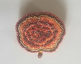 Broche "Oeillet" ambre