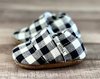 Trendy Baby Moccasins - Black And White Buffalo Check Angled