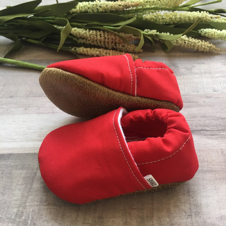 red baby moccasins