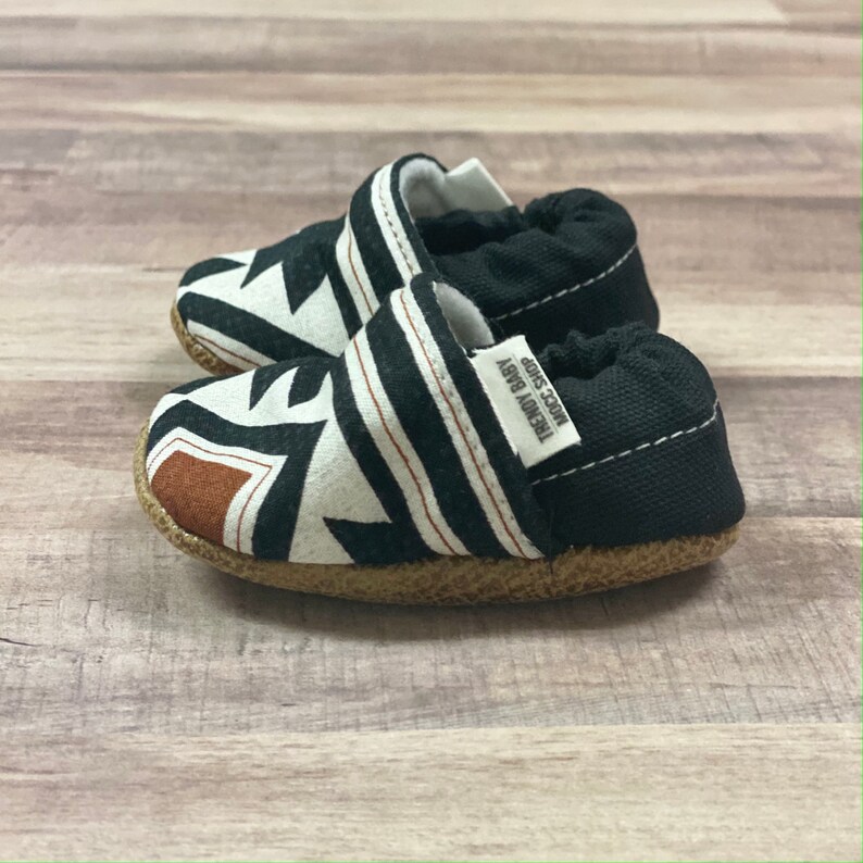 BUY 2, GET 1 FREE: Trendy Baby Moccasins Orange & Black Aztec, southwest baby booties, Aztec baby shoes, tribal baby soft sole shoes image 1