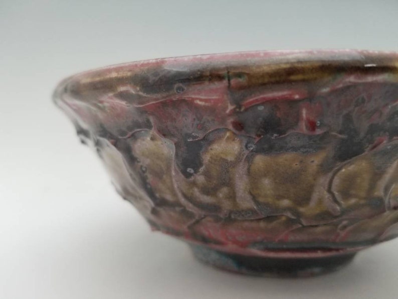 Cracked Slip Textured Wheel Thrown Soda Fired Bowl Crimson Dripping through Rustic Iron Crystals Over Cracked Texture,2.75tall 7.25wide