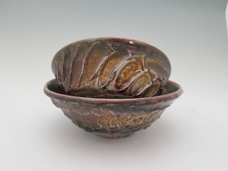 Cracked Slip Textured Wheel Thrown Soda Fired Bowl Crimson Dripping through Rustic Iron Crystals Over Cracked Texture,2.75tall 7.25wide