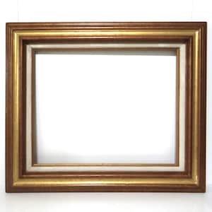 May include: A rectangular picture frame featuring a multi-layered design with a metallic gold finish on the outer and inner edges, separated by a recessed, off-white linen-textured border that provides a neutral contrast to the metallic frame.