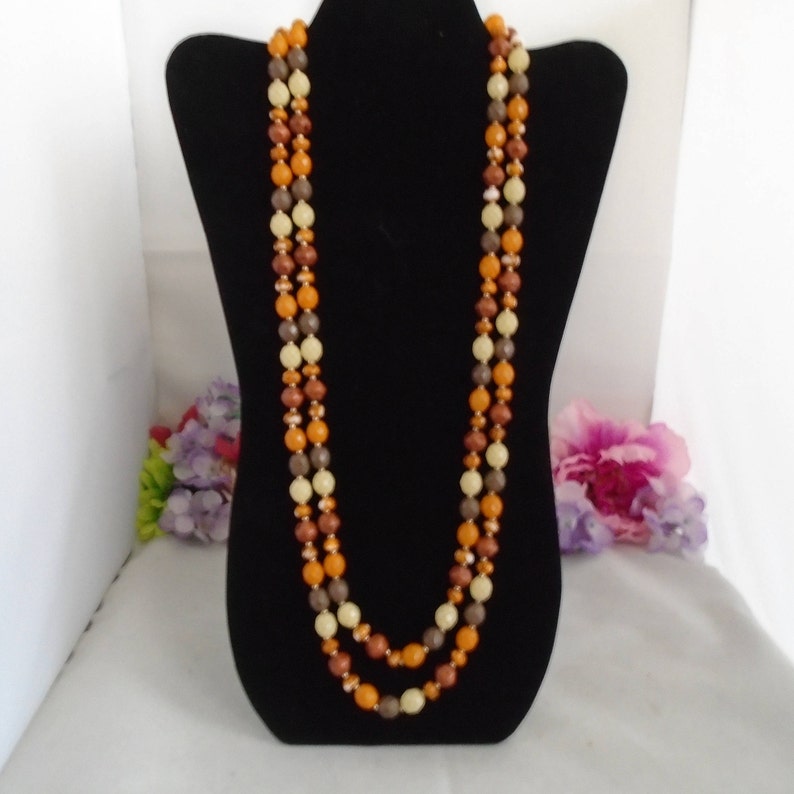 Some chipped but others are fine. Perfect for Crafts The Necklace is 60 Long Reduced JOAN RIVERS 60 Necklace Autumn Colored Beads