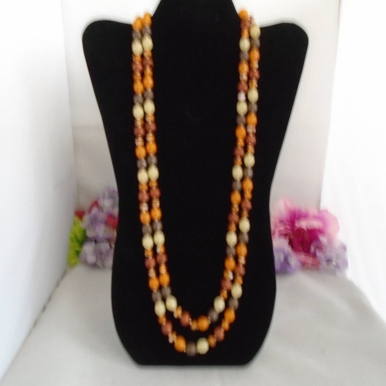 Some chipped but others are fine. Perfect for Crafts The Necklace is 60 Long Reduced JOAN RIVERS 60 Necklace Autumn Colored Beads