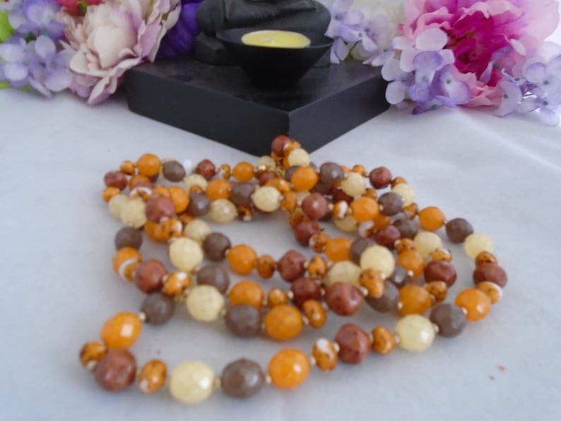 Some chipped but others are fine. Perfect for Crafts The Necklace is 60 Long Reduced JOAN RIVERS 60 Necklace Autumn Colored Beads