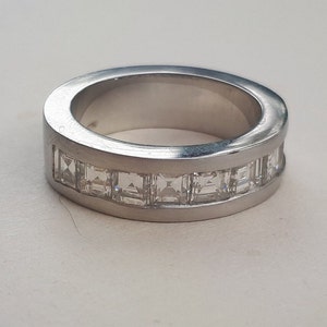 Modernist platinum diamond eternity ring