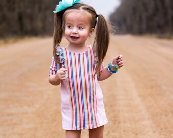 Baby Autumns Knit ruffle top and shift dress for toddlers and girls sizes 2t-12. PDF sewing pattern with projector file.