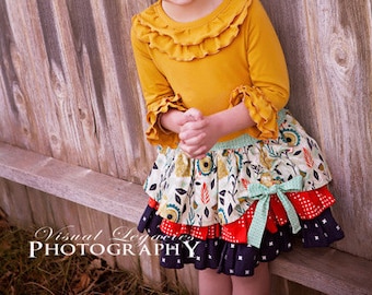 Pepper's Peekaboo Ruffle Skirt. PDF sewing pattern for toddler girl sizes 2t - 12.