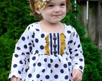 Ruby's Ruffle A-line Top & Dress . PDF sewing pattern for toddler girl sizes 2t - 12.