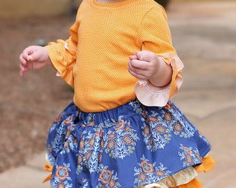 Baby Pepper's Peekaboo Ruffle Skirt. PDF sewing pattern for baby sizes NB-24 months