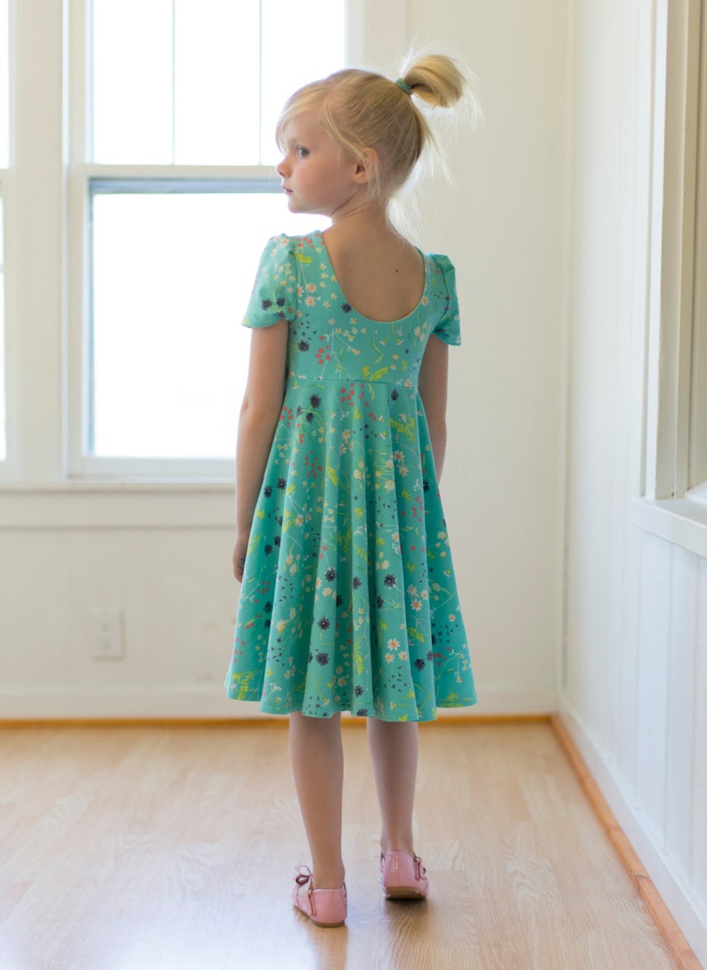 Adelyn's Scoop back knit/ woven tunic and dress. PDF sewing pattern for toddler girl sizes 2t 12. image 1