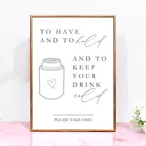 May include: A rectangular sign in a thin metallic frame featuring black text that reads TO HAVE AND TO hold AND TO KEEP YOUR DRINK cold PLEASE TAKE ONE! with a line drawing of a beverage cooler featuring a small heart icon on the front.