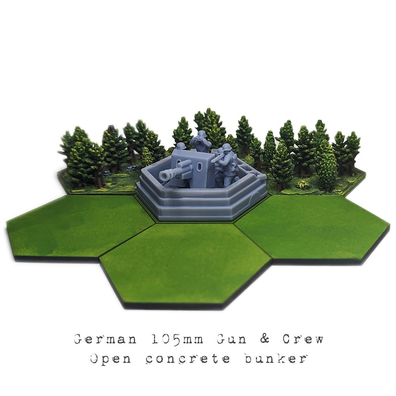 May include: A gray, open concrete bunker with a 105mm gun and crew figures. The bunker is surrounded by green trees and grass.
