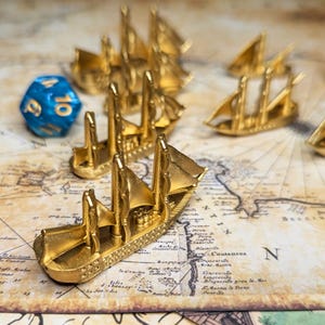 Golden Treasure Ships Merchants & Marauders Set of 7 Board Game Tokens | Custom Meeple, Sailing Ships, Pirates Privateers, Pirate Borg