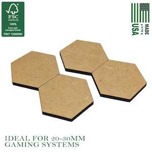 May include: Four hexagonal wooden tiles with a light brown surface and black edges. The FSC logo and "Made in the USA" text are visible. The text "IDEAL FOR 20-30MM GAMING SYSTEMS" is also present.
