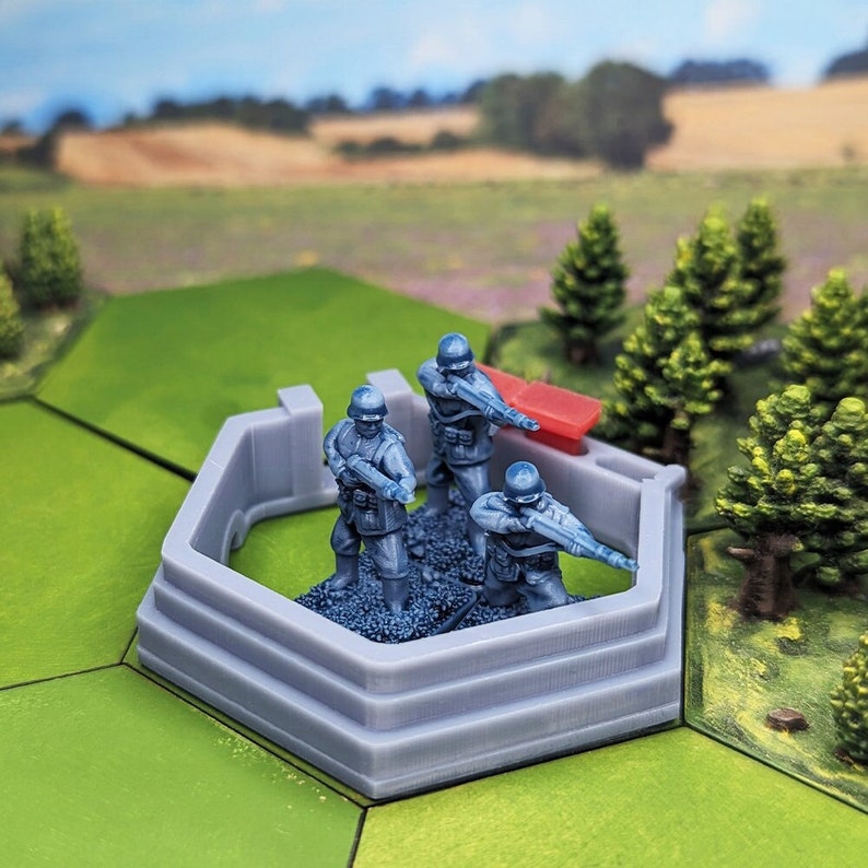 May include: Three blue plastic toy soldiers standing in a gray plastic bunker with a red plastic wall behind them. The bunker has three steps and is hexagonal in shape.