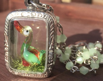 Glass lamp work unique handmade silver custom duck animal love necklace miniature world jewellery. Wearable art beaded jade necklace.