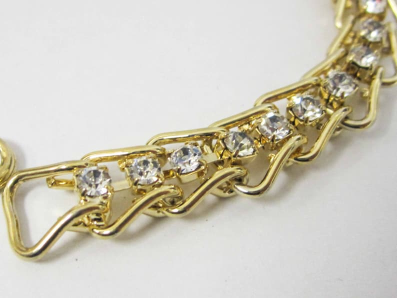 ONE GOLD plated bracelet with crystals