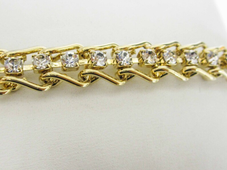 ONE GOLD plated bracelet with crystals