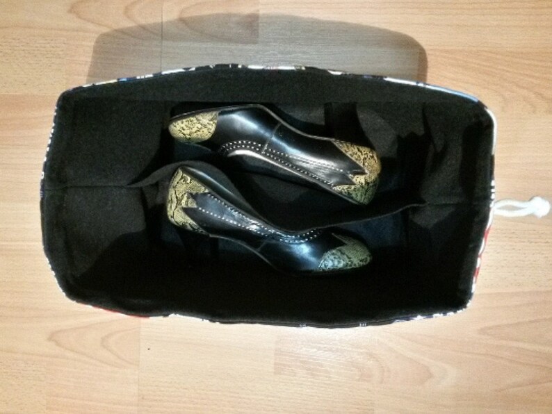 interior lining Soft. Center divide to protect shoes Navy shoe bag w wine bag Flight attendant Flight crew Use for home or travel.