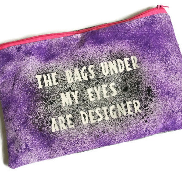 Ladies Purple Make up Bag Funny Quote 'The bags under my eyes are designer'