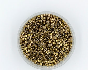 Toho 457, 3mm cube, Metallic Bronze, 30 grams