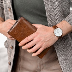 brown leather wallet - the periodic table - time resistance