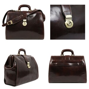 May include: A brown leather doctor's bag with a brass lock and buckle. The bag has a shoulder strap and is made of high-quality leather.