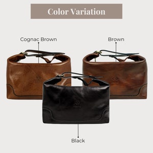 May include: Three leather bags in different colors: cognac brown, brown, and black. Each bag has a top handle and a flap closure. The bags are arranged in a row, with the cognac brown bag on the left, the brown bag in the middle, and the black bag on the right.