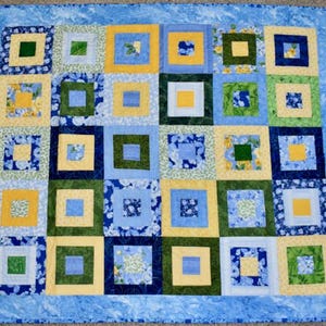 Scrappy Squares with Holes Design – LAP QUILT – Blue, Green & Yellow
