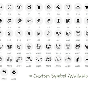 May include: A chart of 32 different symbols, including zodiac signs, religious symbols, animals, and other designs. The symbols are arranged in a grid with labels below each one. The text "Custom Symbol Available" is at the bottom of the chart.