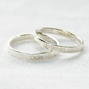 Puede incluir: Dos anillos de plata con los nombres "Caylee" y "Benjamin" grabados en ellos.
