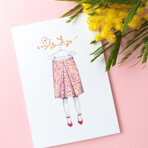 SKIRT.WOMAN.FLOWERS.Wenskaart. Kaart voor vrouwen en meisjes. Roze rokhanger en bloemen. Print.Illustration.Pattern.Rode schoenen.