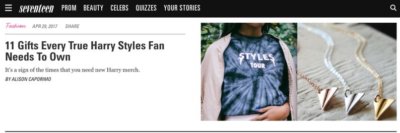 May include: A tie-dye t-shirt with the text "STYLES TOUR" in white, and three triangle pendant necklaces in rose gold, silver, and gold. The image is from a Seventeen article about Harry Styles.