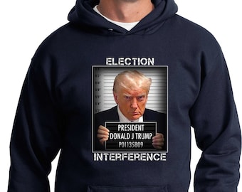 Donald Trump Mug Shot Interferencia electoral Adulto Sudadera con capucha unisex 25514HD2-PC90H