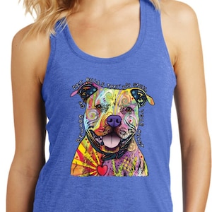 May include: Blue tank top featuring a colorful, artistic pit bull design with the text "Beware of Pit Bulls They Will Steal Your Heart." The dog illustration includes a heart-shaped pendant.
