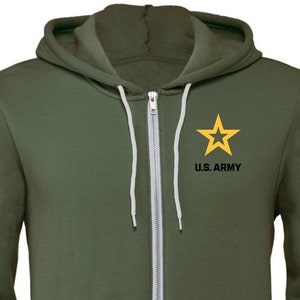 May include: A green zippered hoodie with a yellow star and the text "U.S. ARMY" on the front.