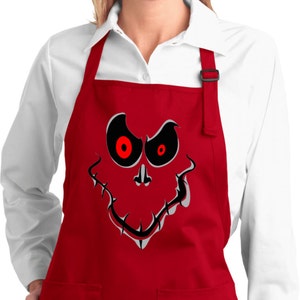 May include: Red apron with two pockets and a scary face design with red eyes. The face is white with black outlines.