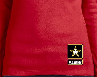 May include: Red long-sleeve shirt with a U.S. Army patch featuring a white star on a black background with yellow trim.