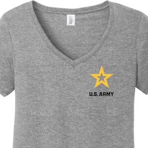 May include: A heather grey V-neck t-shirt with a yellow star and the text "U.S. ARMY" printed on the front.