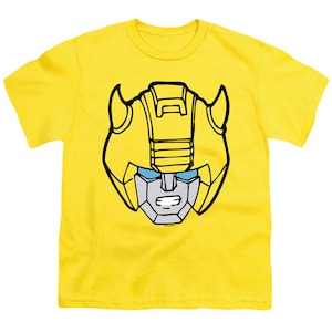 May include: Yellow short-sleeved t-shirt with a black and white outline of Bumblebee's head from the Transformers cartoon.