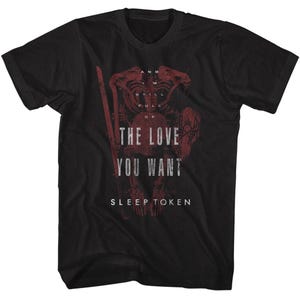May include: Black t-shirt featuring a red graphic design with the text "THE LOVE YOU WANT" and "SLEEP TOKEN". The design includes a stylized figure and additional text at the top.