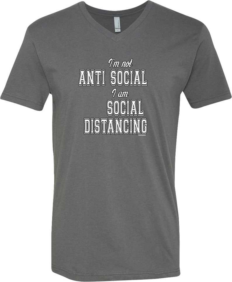 May include: A dark gray V-neck t-shirt with the text "I'm not anti social I am social distancing" printed in white.