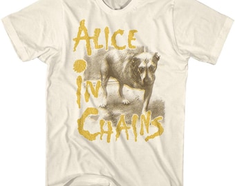 May include: A white t-shirt featuring a faded image of a dog and the text "Alice in Chains" in yellow.