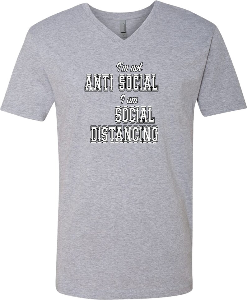 May include: Gray V-neck t-shirt with the text "I'm not anti social I am social distancing" in black.